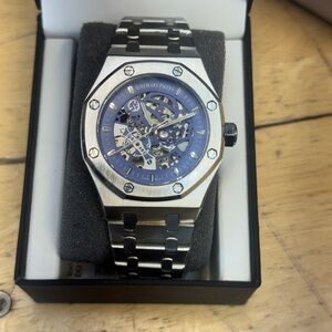 Silver and Blue Skeleton Watch